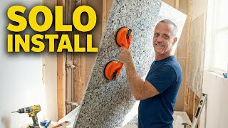 This Simple Trick Makes Heavy Shower Panels Manageable