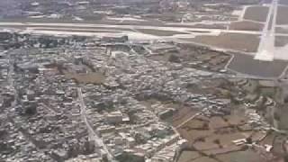 preview picture of video 'Landing at Luqa airport and a visit to the Tarxien village festa'