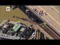 Barge hits bridge in Galveston, Texas, causing oil spill - Video