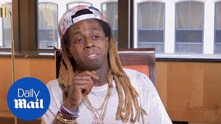 Lil Wayne: White cop saved me after shooting myself at 12 - Daily Mail