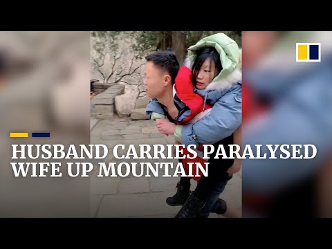 Husband carries paralysed wife up mountain to keep a long-held promise