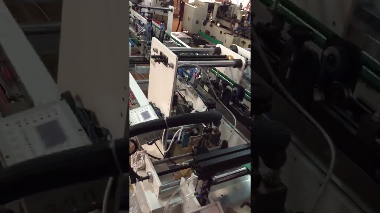 Full-Automatic Plastic Folder Gluer with bottom lock function.