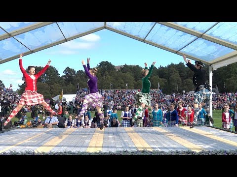 Braemar Gathering 2017 - Highland Reel dance with male & female competitors during highland games