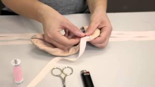 preview picture of video 'Premier School of Dance: How to sew ribbons on flat ballet shoes'
