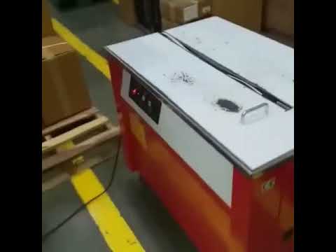 Box Strapping Machine