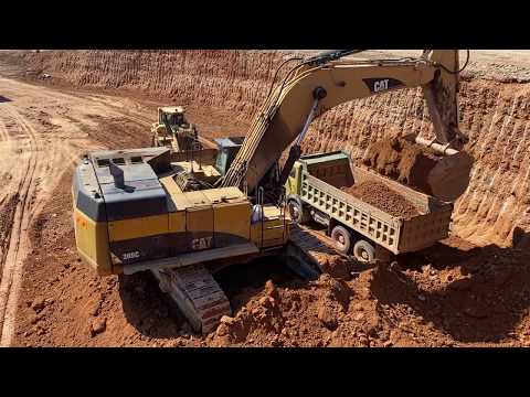 Caterpillar 365C Excavator Loading Trucks