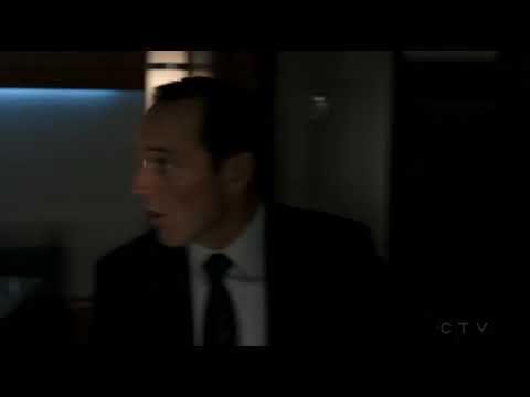 Agent Coulson and Skye escaping in Coulson's flying car LOLA..