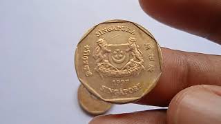 " ONE 1 DOLLAR 1997 ERROR  COINS FROM SINGAPORE " YOU CAN SELL IT...