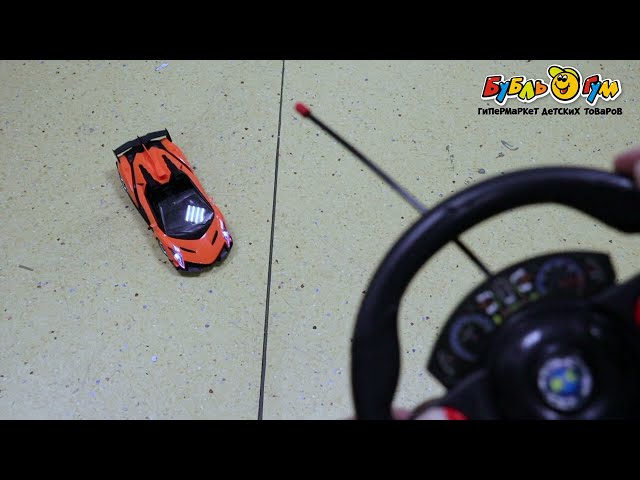  Автомобиль гоночный Lanson Toys р/у с педалями и рулем оранжевый 1:16 - видео