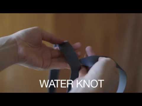 Part of a video titled Climbing tips: Water knot (joining webbing) - YouTube