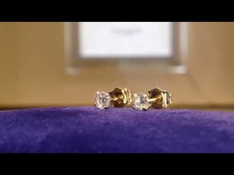 .25 carat diamond studs set in 14K gold
