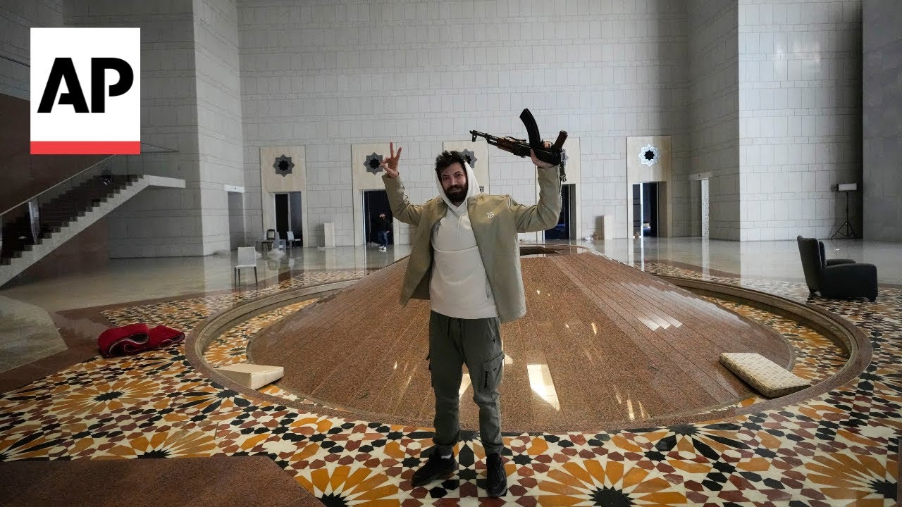 Syrian opposition fighters storm the Syrian presidential palace in Damascus