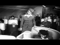 Passengers are served food inside a mock-up of the futuristic Stratocruiser aircr...HD Stock Footage
