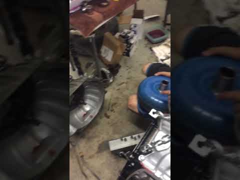 Installing torque converter into a Ford C4 transmission