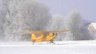 preview picture of video 'Flying a Cub on Skis'