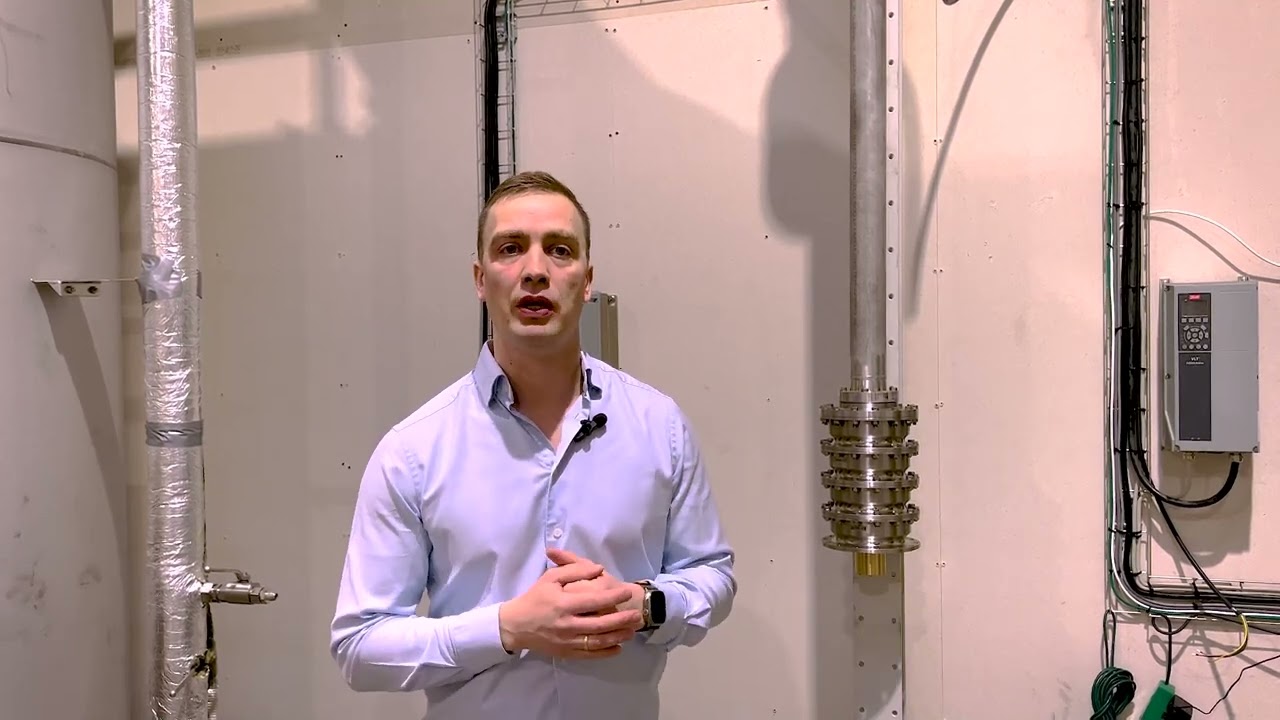 How do you ensure stability at low NPSH levels with a can-mounted vertical pump?