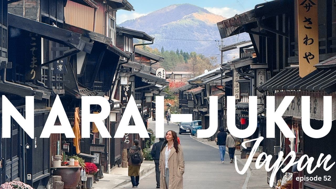 A traveler immerses themselves in the captivating allure of Narai-juku town.