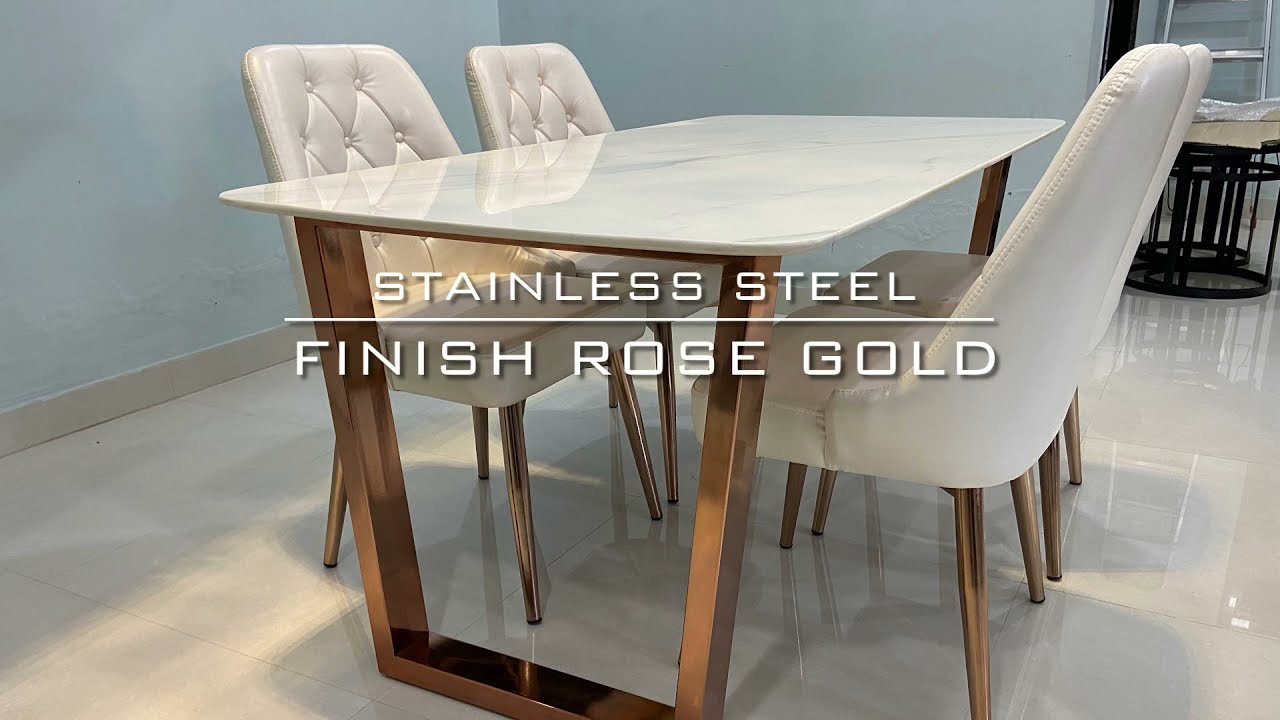Watch video Indiskie Rose Gold Dining Table Four Seater Stainless Steel Satvario Marble Top Now Indiskie Rose Gold Dining Table Four Seater Stainless Steel Satvario Marble Top