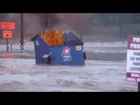 Dumpster Fire Floating Down River