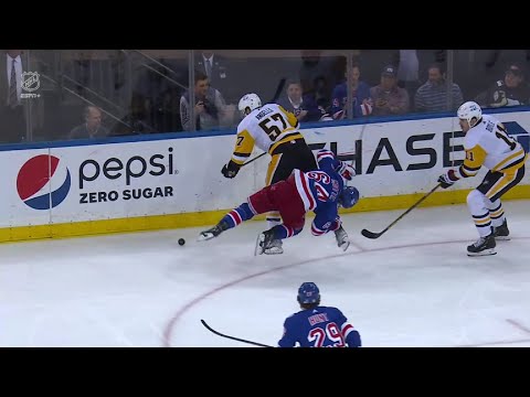 Anthony Angello lays a big hit on Tyler Motte