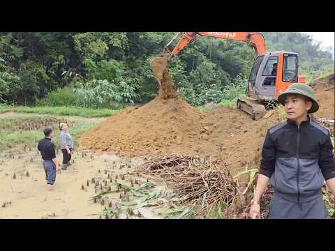 With the money he had, Hang hired a machine to dig the foundation for his house faster.