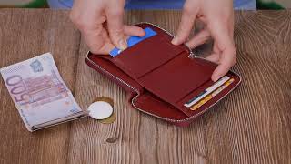 Шкіряний гаманець для жінок на блискавці з металевим логотипом виробника ST Leather 19485 бордовий