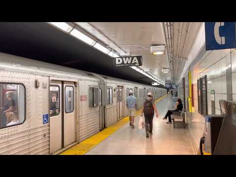 An Eastbound Bombardier T1 Subway Train on line 2 Arriving & Departing Bathurst Station 9/18/2022