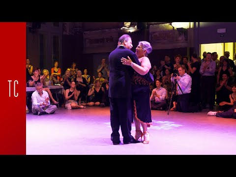  Jorge Dispari  and  María del Carmen Romero  are  dancing  to  the  tango  "  Color Cielo  "  by  Juan D'Arienzo  at  Antwerpen Tango Festival  in  2019