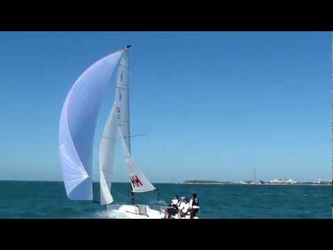 North Sails-powered J70 Helly Hansen skippered by Tim Healy sails downwind at Key West 2013.