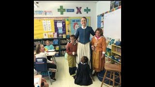 History lesson pic showed black girl on leashes (spiritual commentary)