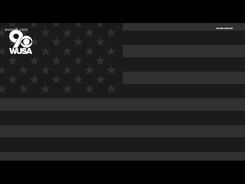 What does an all-black American flag mean, and where does it come from?