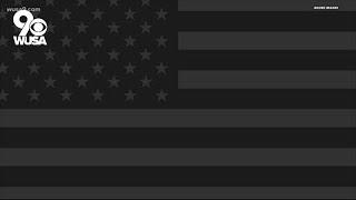 What does an all-black American flag mean, and where does it come from
