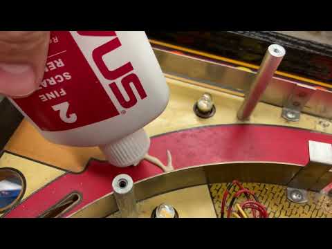 Cleaning and polishing pinball playfields