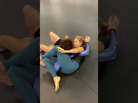 jiu-jitsu woman vs Man in gym fight she dominates and submits it from various positions,talent