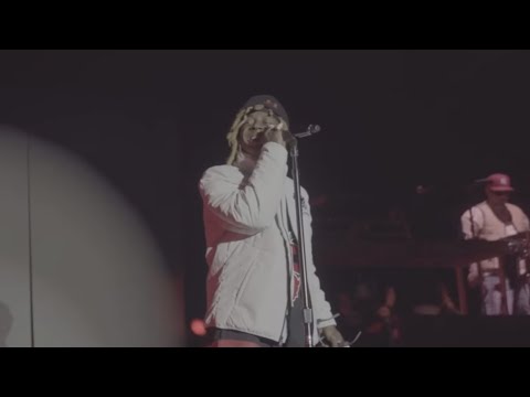 Lil Wayne performing Let The Beat Build at Dreamville Fest 2025