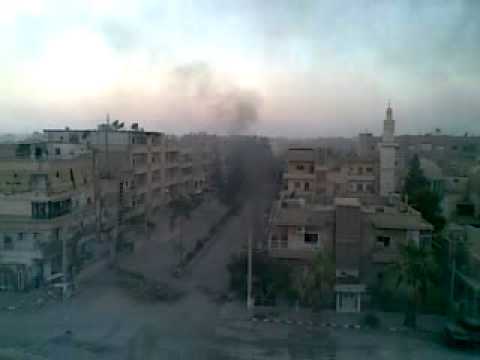 مرابطة كتيبة أحفاد عائشة أحرار شعيطات على إحدى الجبهات في مدينة دير الزور