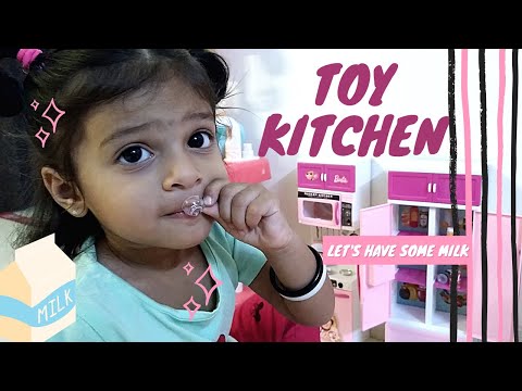 Yashashree pretends to play with Barbie Kitchen