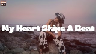 Buck Owens - My Heart Skips A Beat (Lyrics)