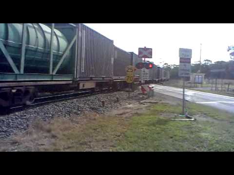 QRNational 2816 freight train heading southbound through Howard Queendsland