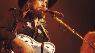 Stop The World and Let Me Off by Waylon Jennings from his album Waylon Live The Expanded Edition