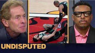 UNDISPUTED | Skip Bayless reacts Jayson Tatum hurts ankle on 'dirty' Bam foul after the whistle