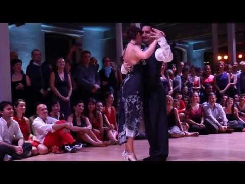  Stefania Colina  and  Juan Martin Carrara  are  dancing  to  a  milonga  at  Łódź Tango Salon Festival  in  2014