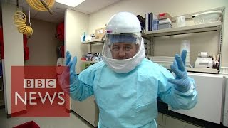 Ebola:  How doctors protect themselves from the virus - BBC News