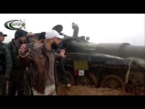 تدمير دبابة بعد استهدفها من قبل كتائب أحرار الشام في كفر نبودة في محافظة حماة