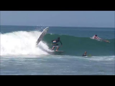 Ryan Coelho (8 years Old) and Alessandro Coelho, surfing with friends in Mâncora - Peru.