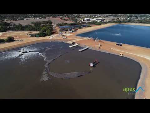 Mud Cat 40E Electric Dredge Used By Apex Envirocare To Dredge Sediment And Sludge From Pond