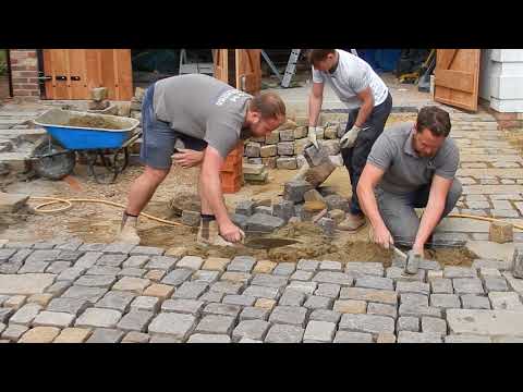 Laying the granite cobble drive