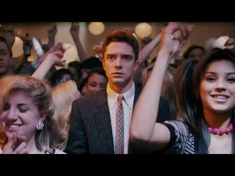 Official trailer still for Take Me Home Tonight showing Topher Grace at a late-80s house party
