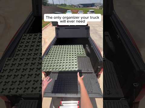 Tmat helps separate the gear you carry so the bed stays easier to use.