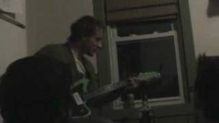 Deer Tick playing Ashamed in a kitchen in Providence